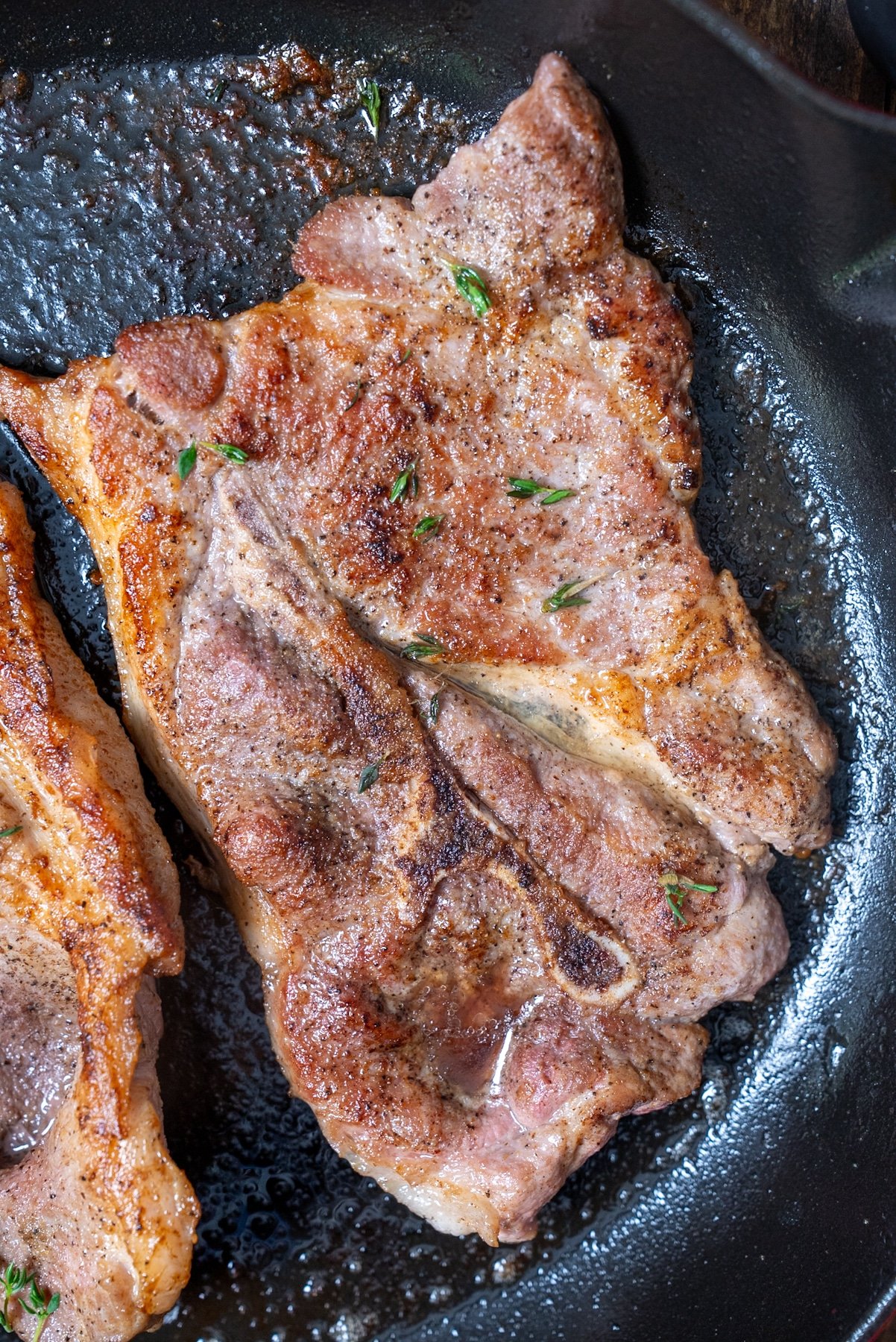 pork steak in skillet