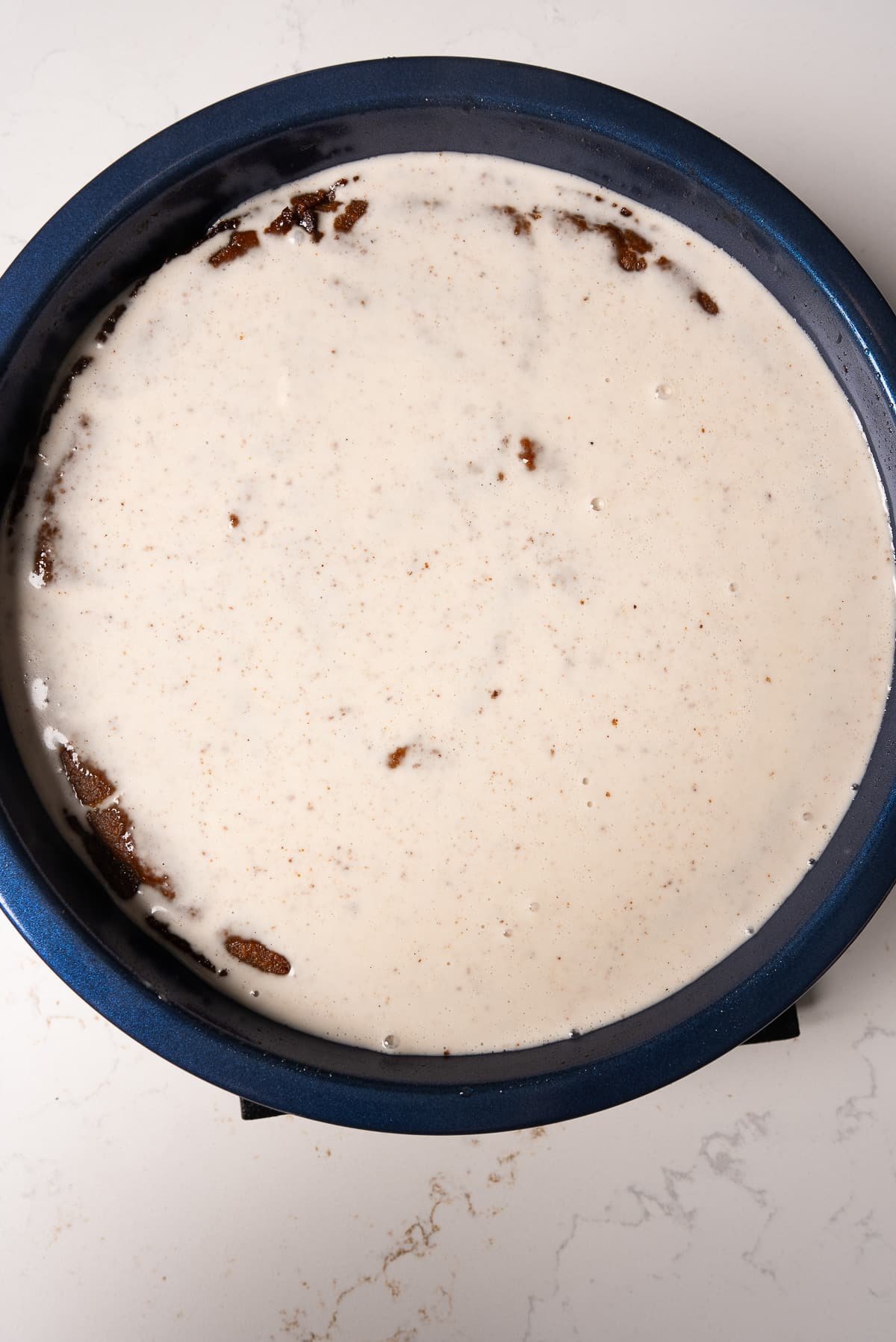 baked pudding with custard on top