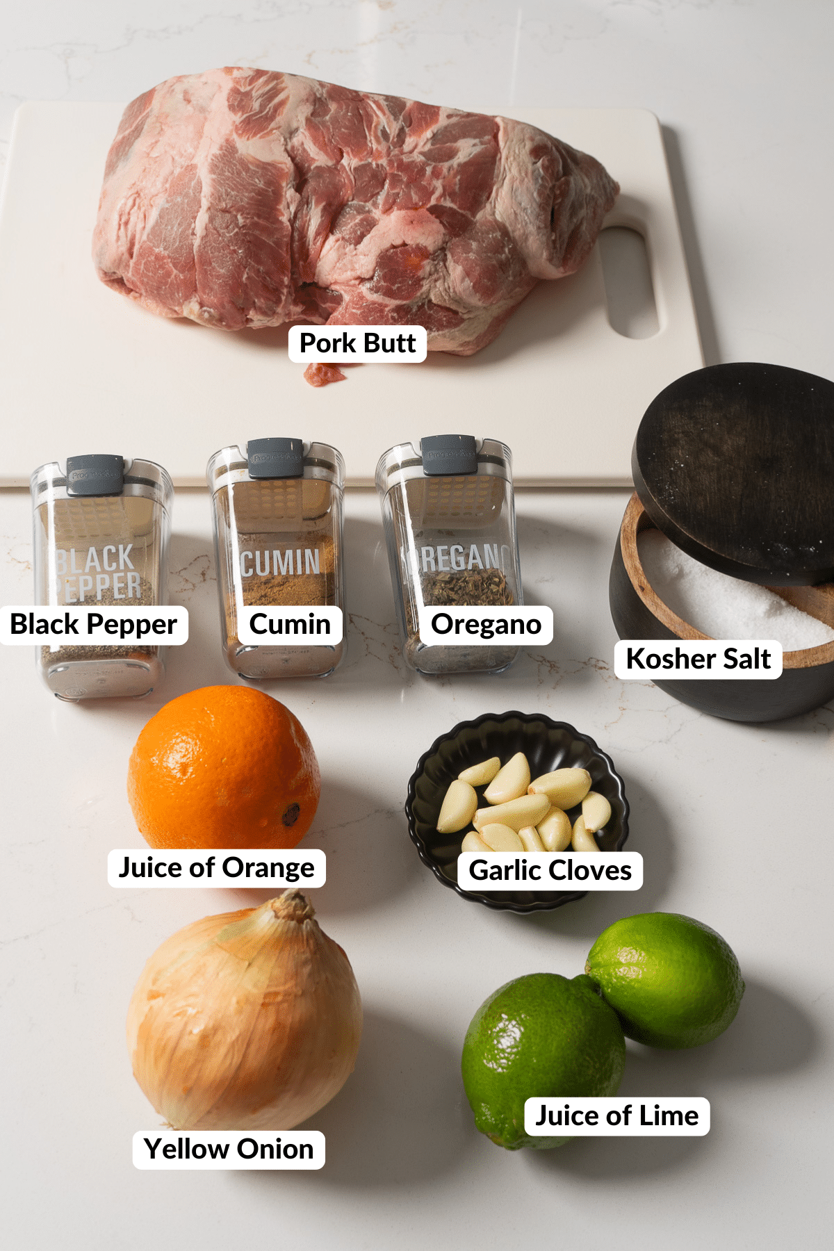 ingredients for pork carnitas on table
