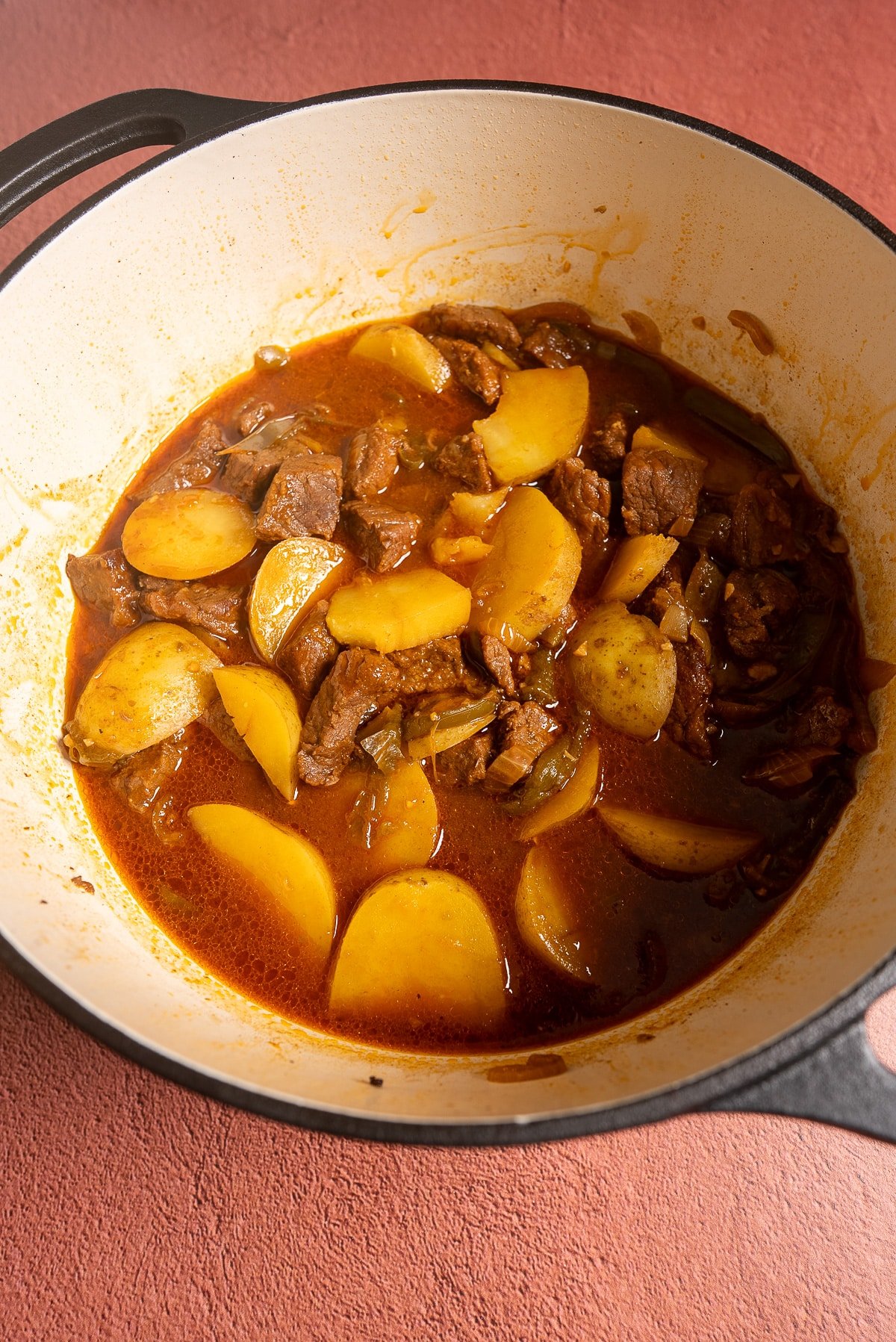 beef stew with uncooked potatoes added