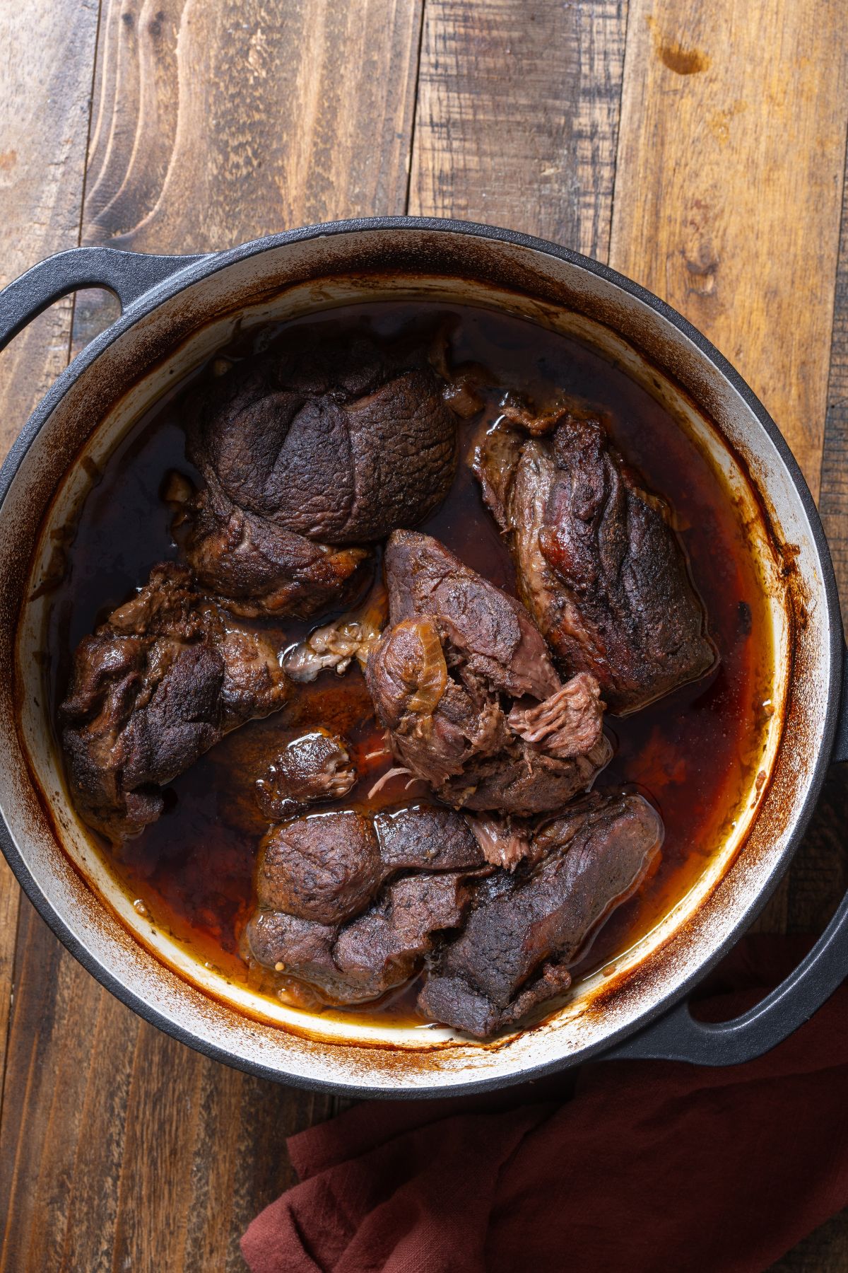 braised lamb pieces before shredding