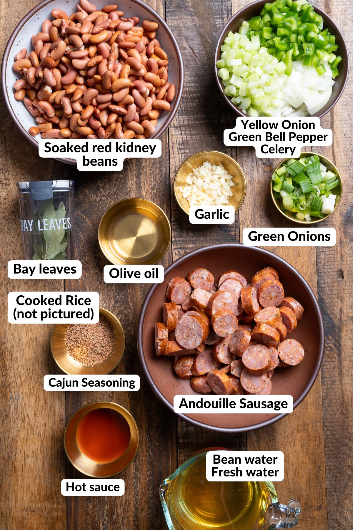 ingredients for red beans and rice on table