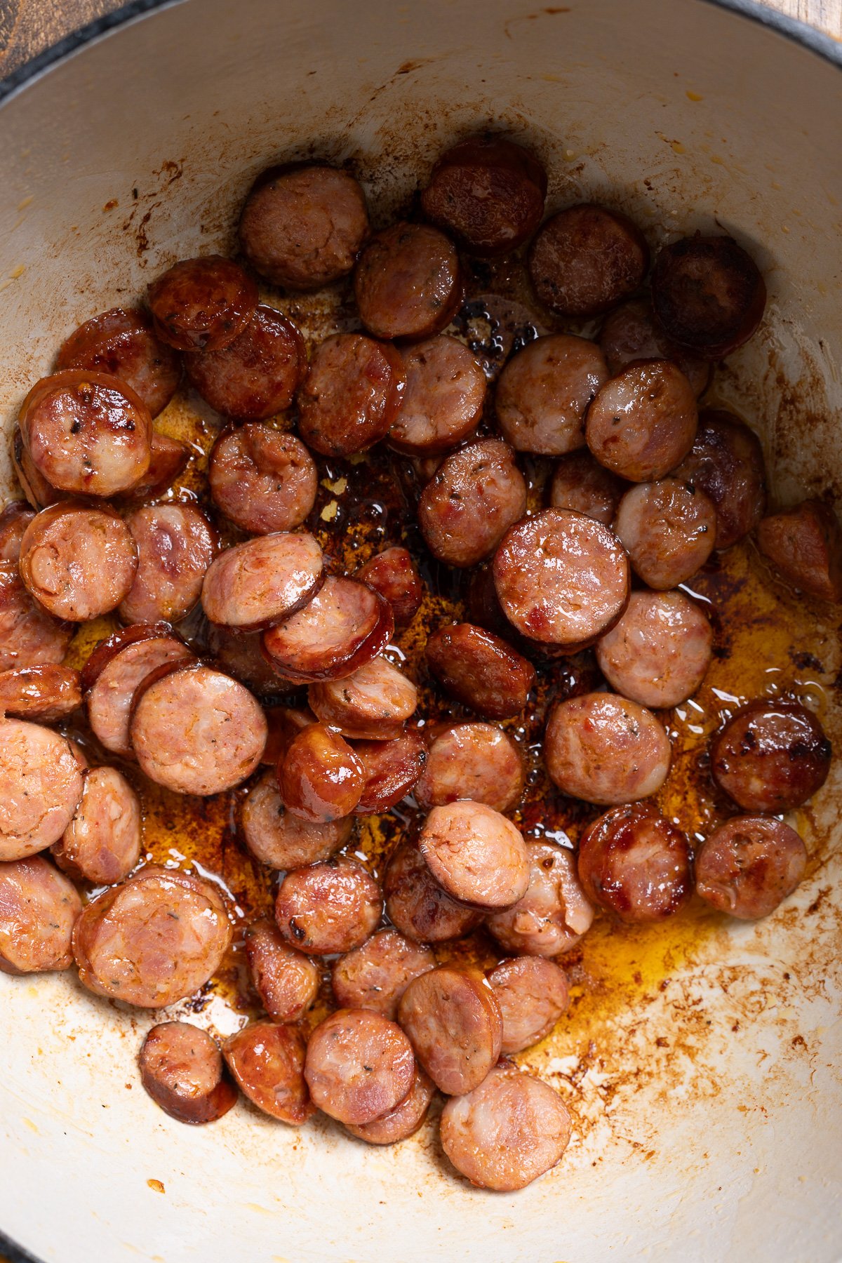 sausage cooking in pot