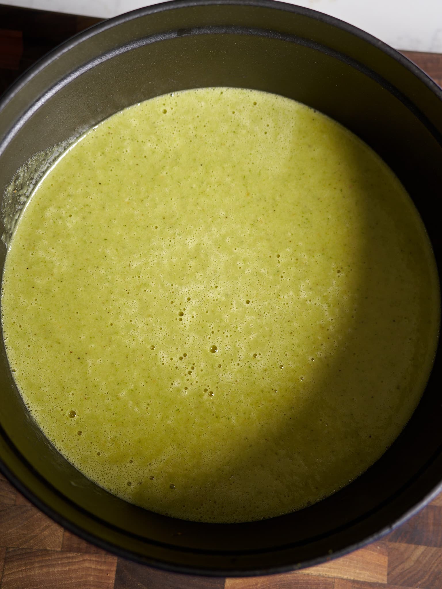 pureed broccoli cheddar soup in pot