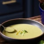 spoon picking up soup from bowl