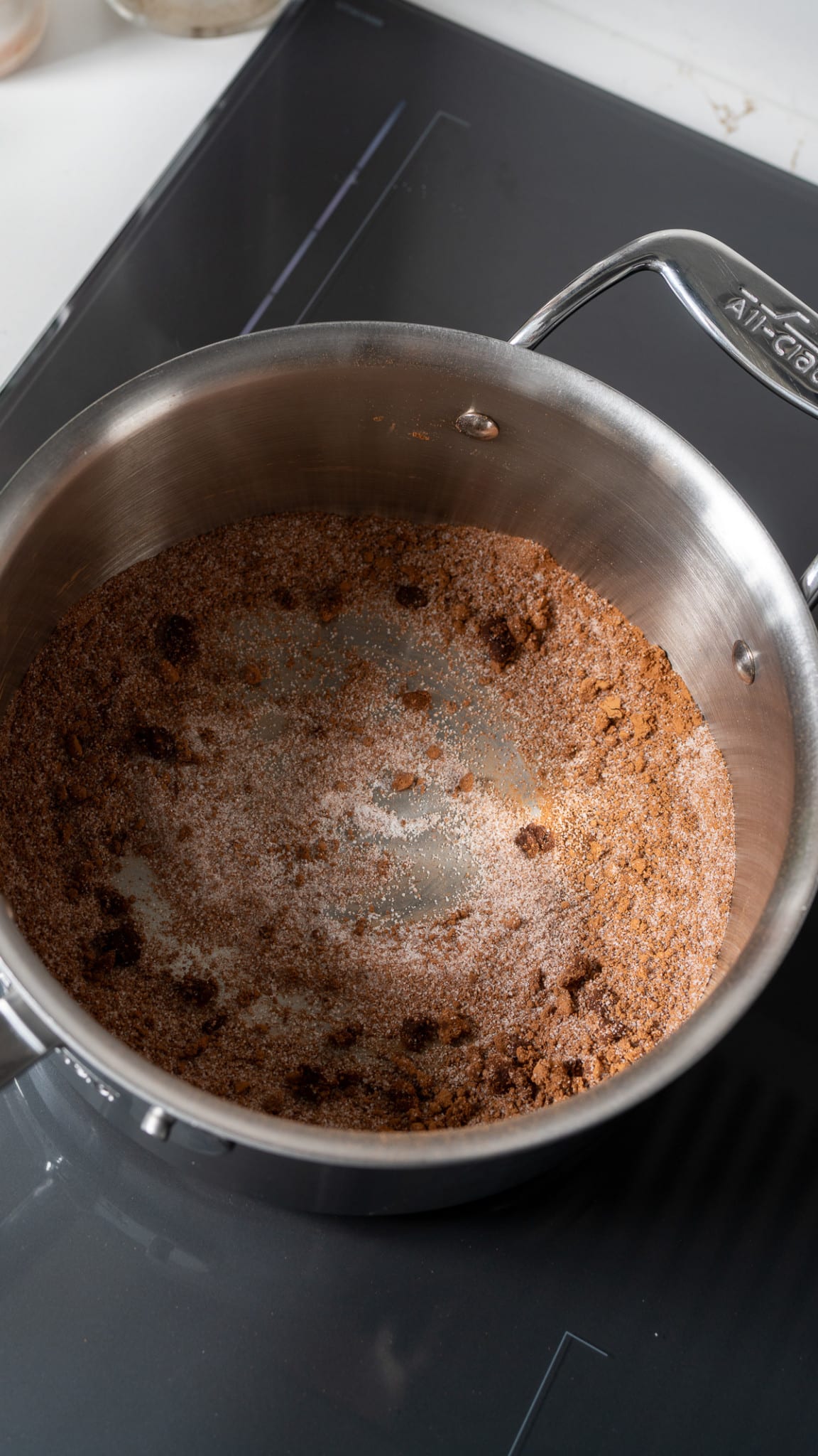 cocoa powder, sugar, and butter in pot