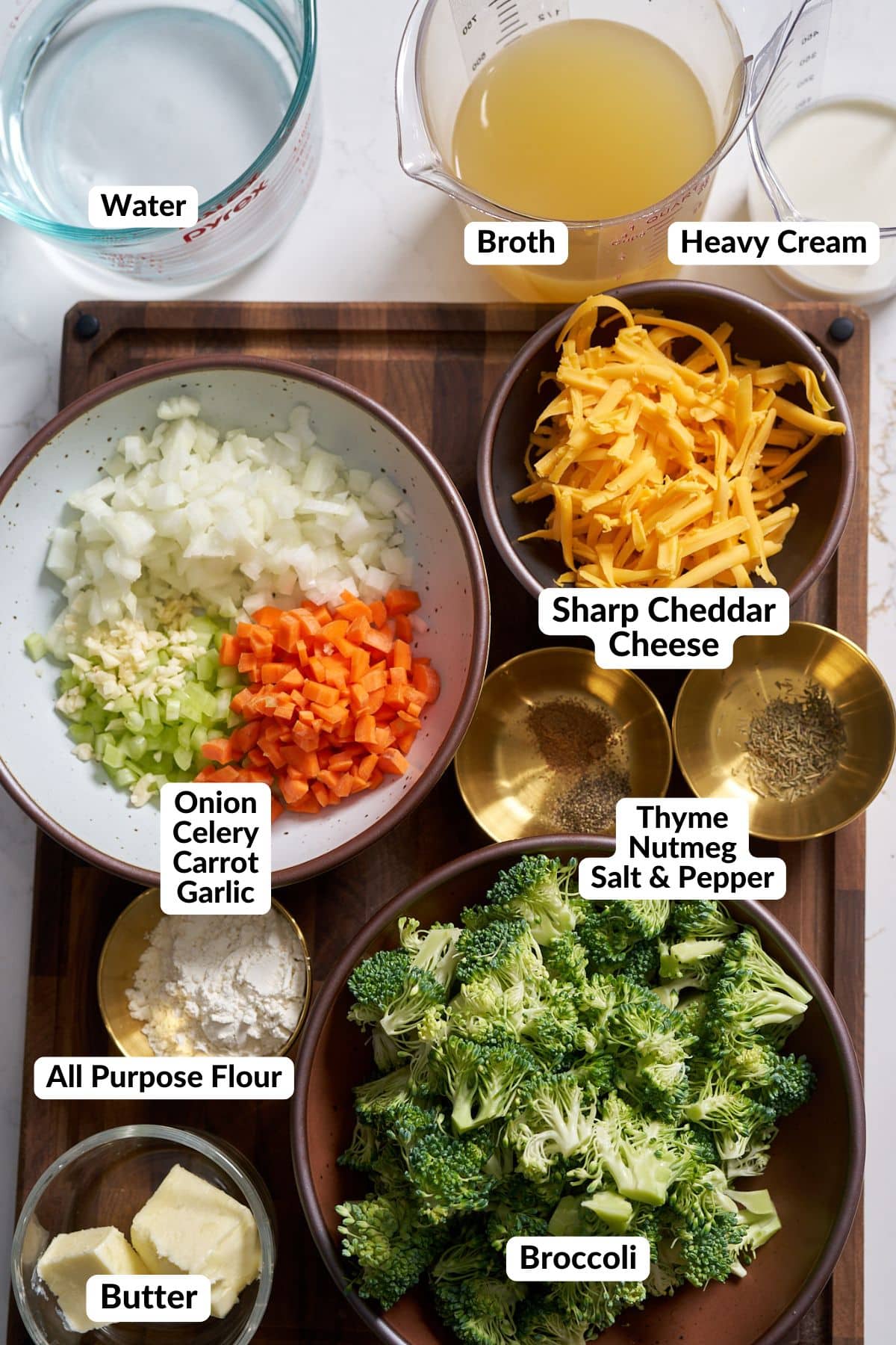 ingredients for broccoli cheddar soup on table