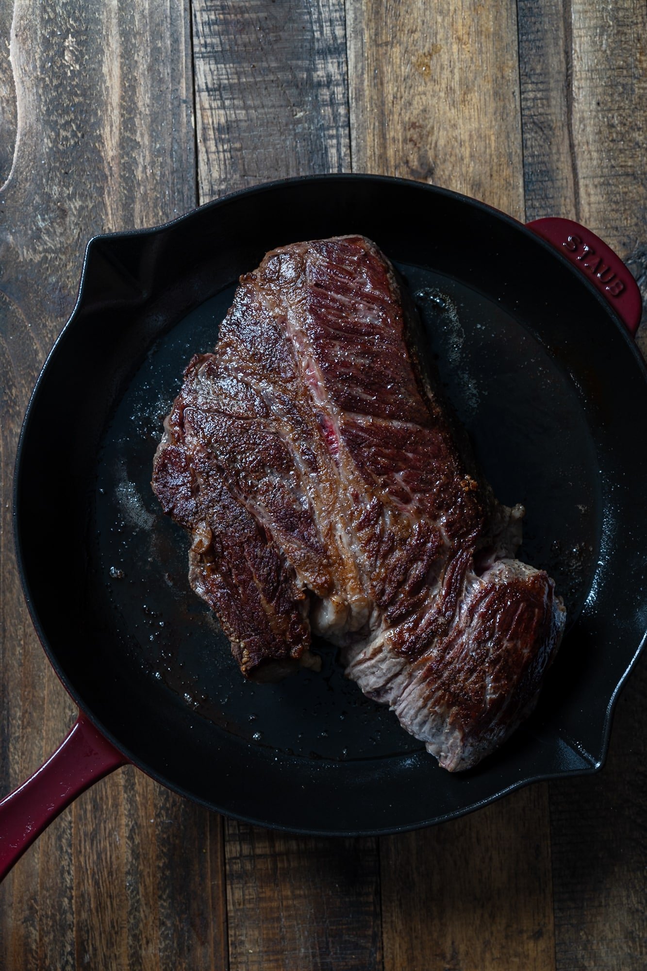 browned beef roast in skillet