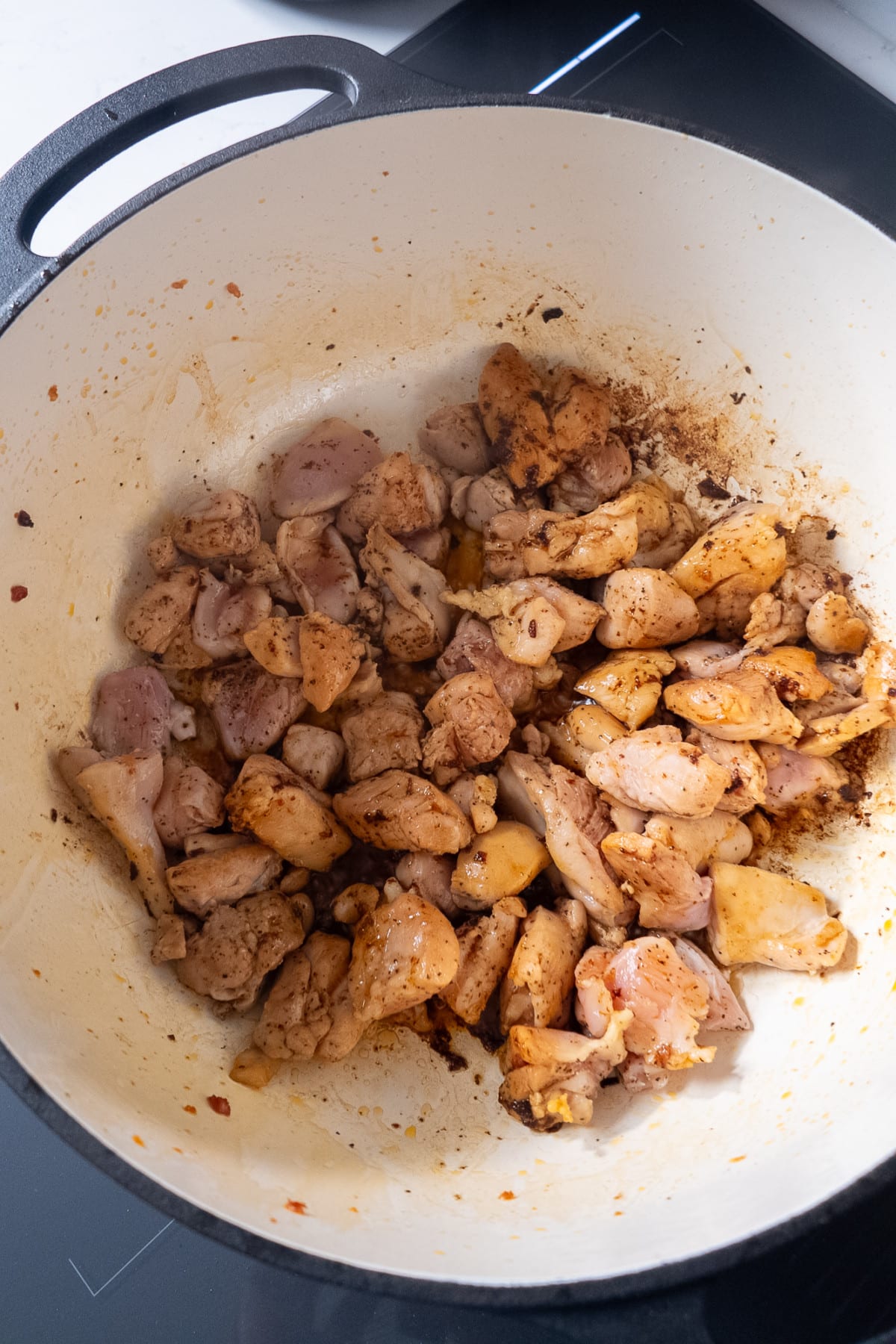 Chicken cooking in pot