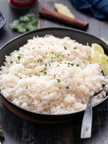 coconut rice in bowl with spoon