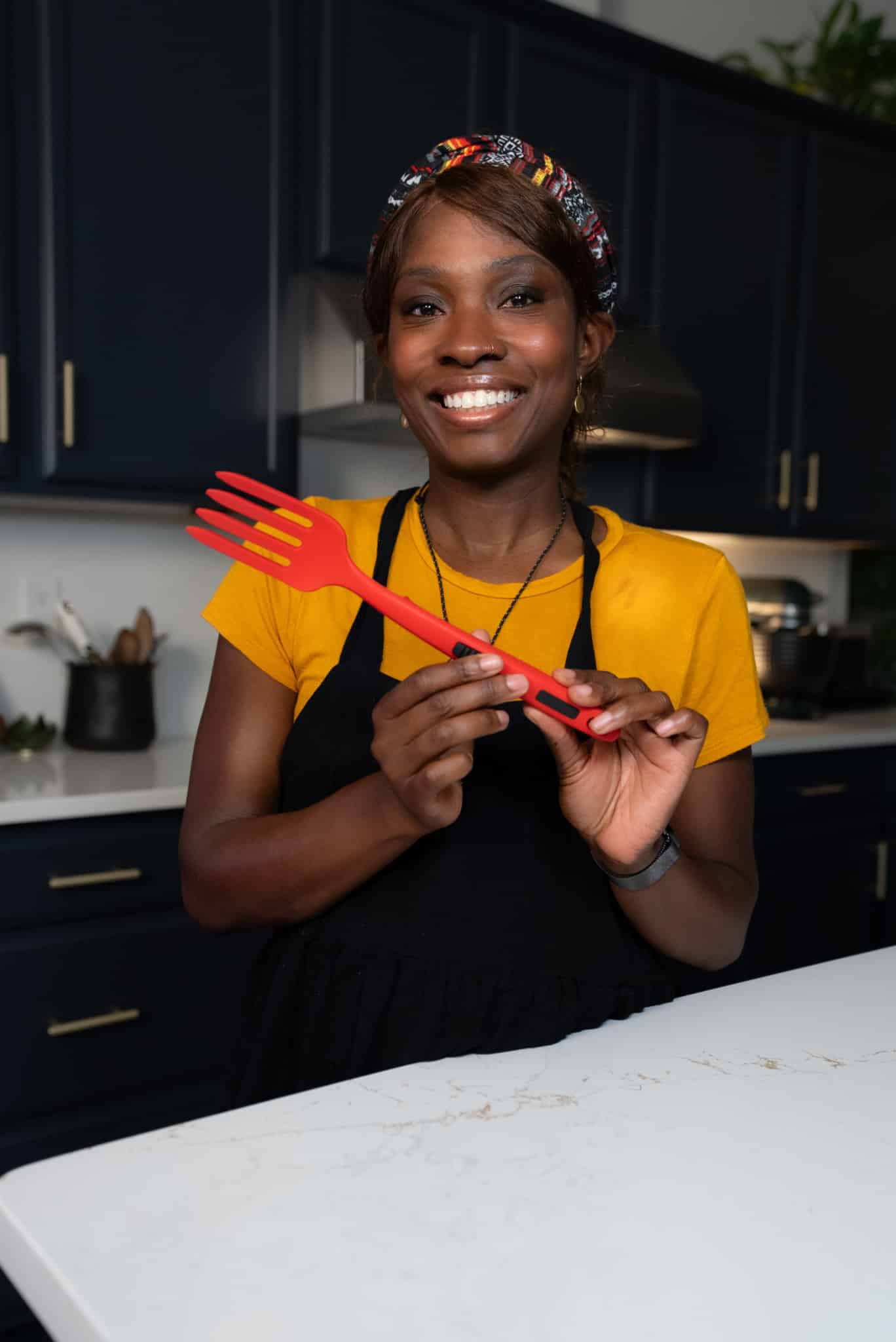 tanya holding a red fork