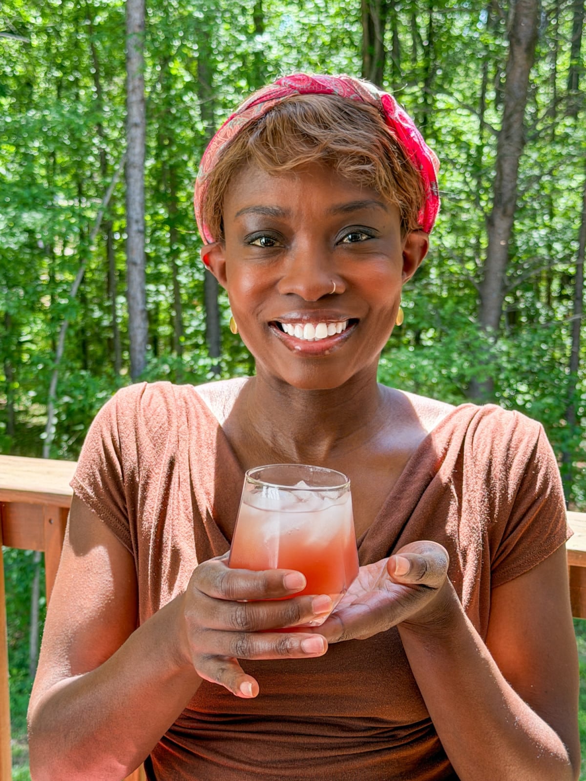 Tanya Harris holding a glass of fruit punch