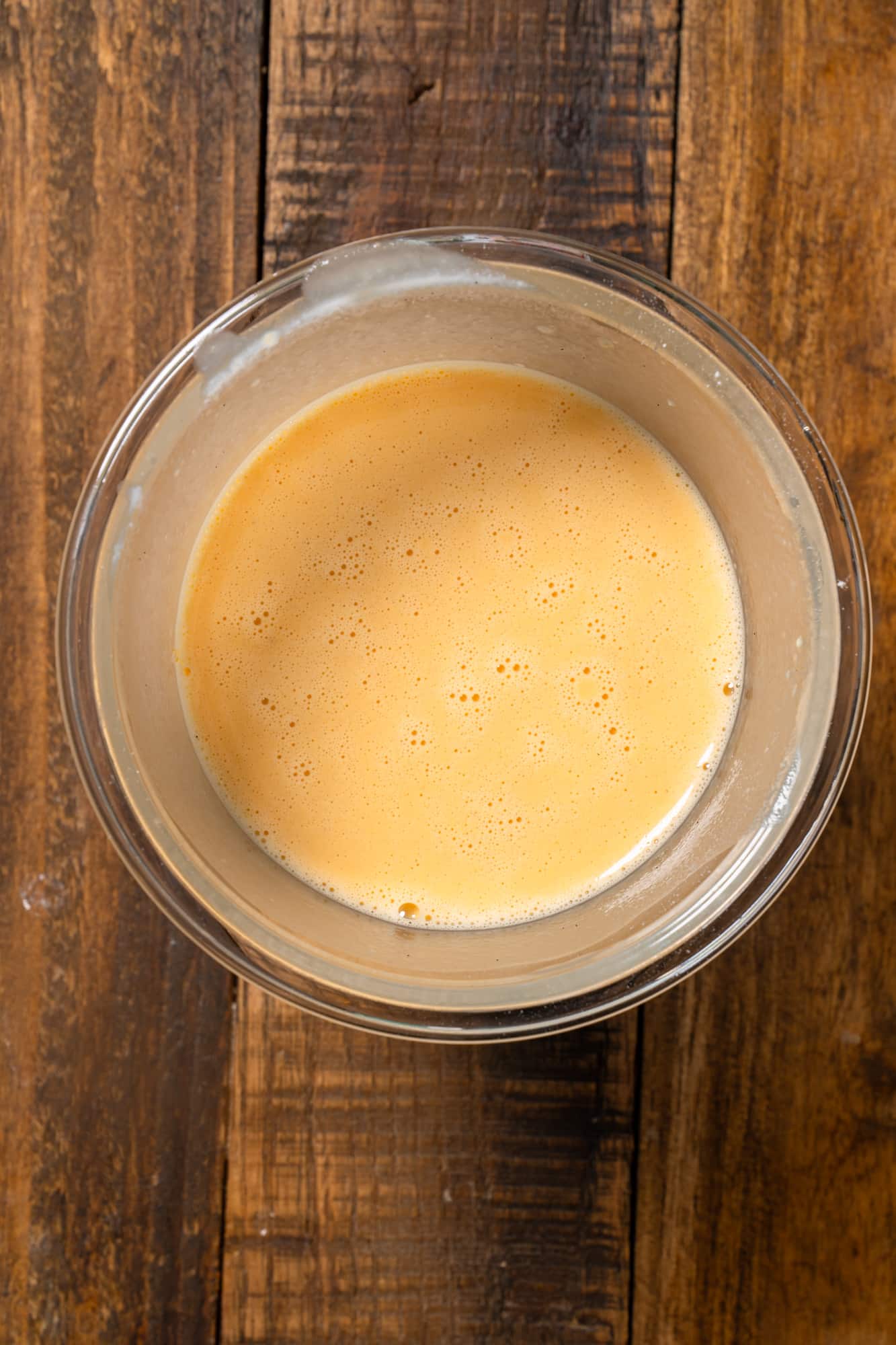 Batter for Dutch baby pancake in a glass jar