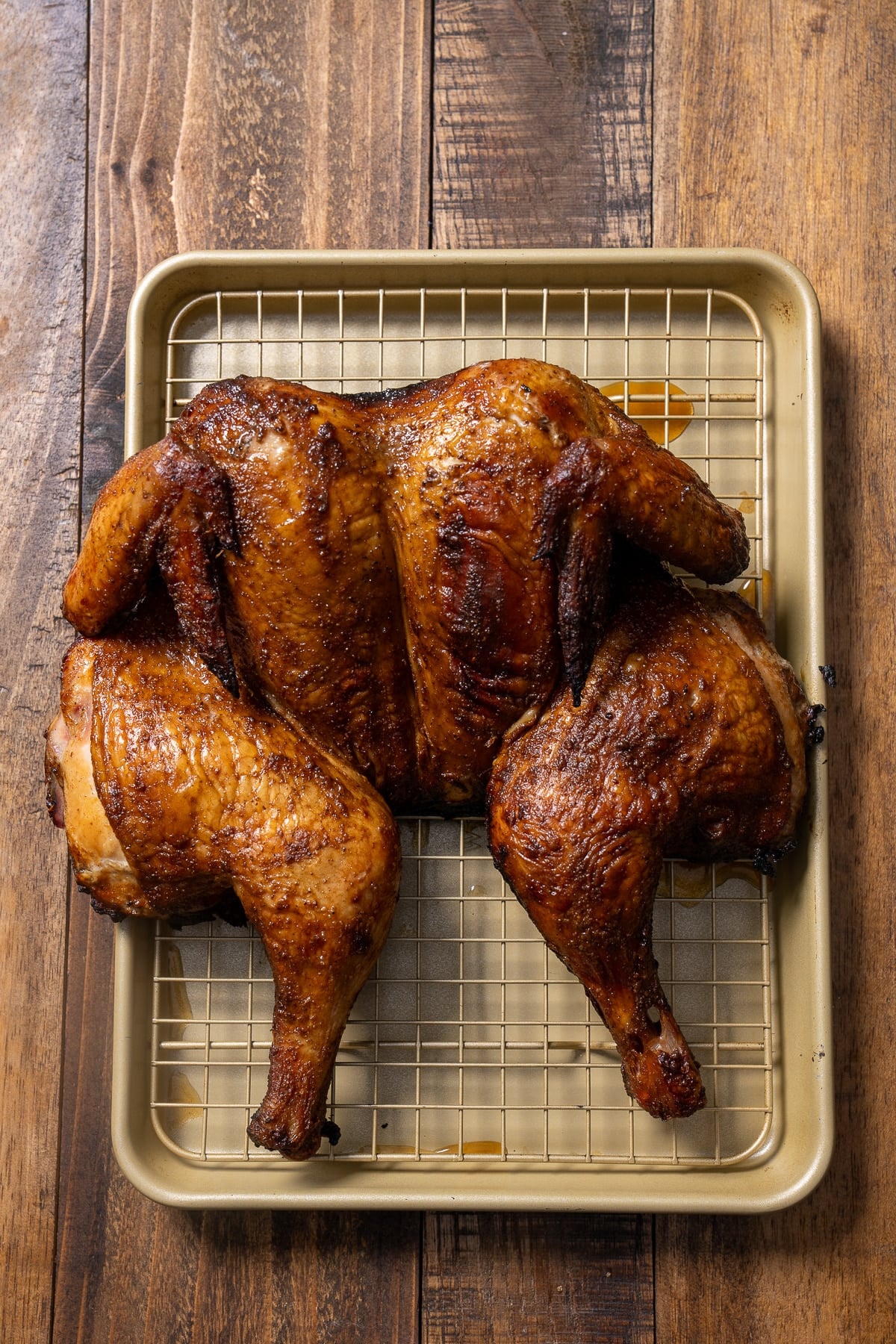 Roasted Peruvian chicken on a baking sheet