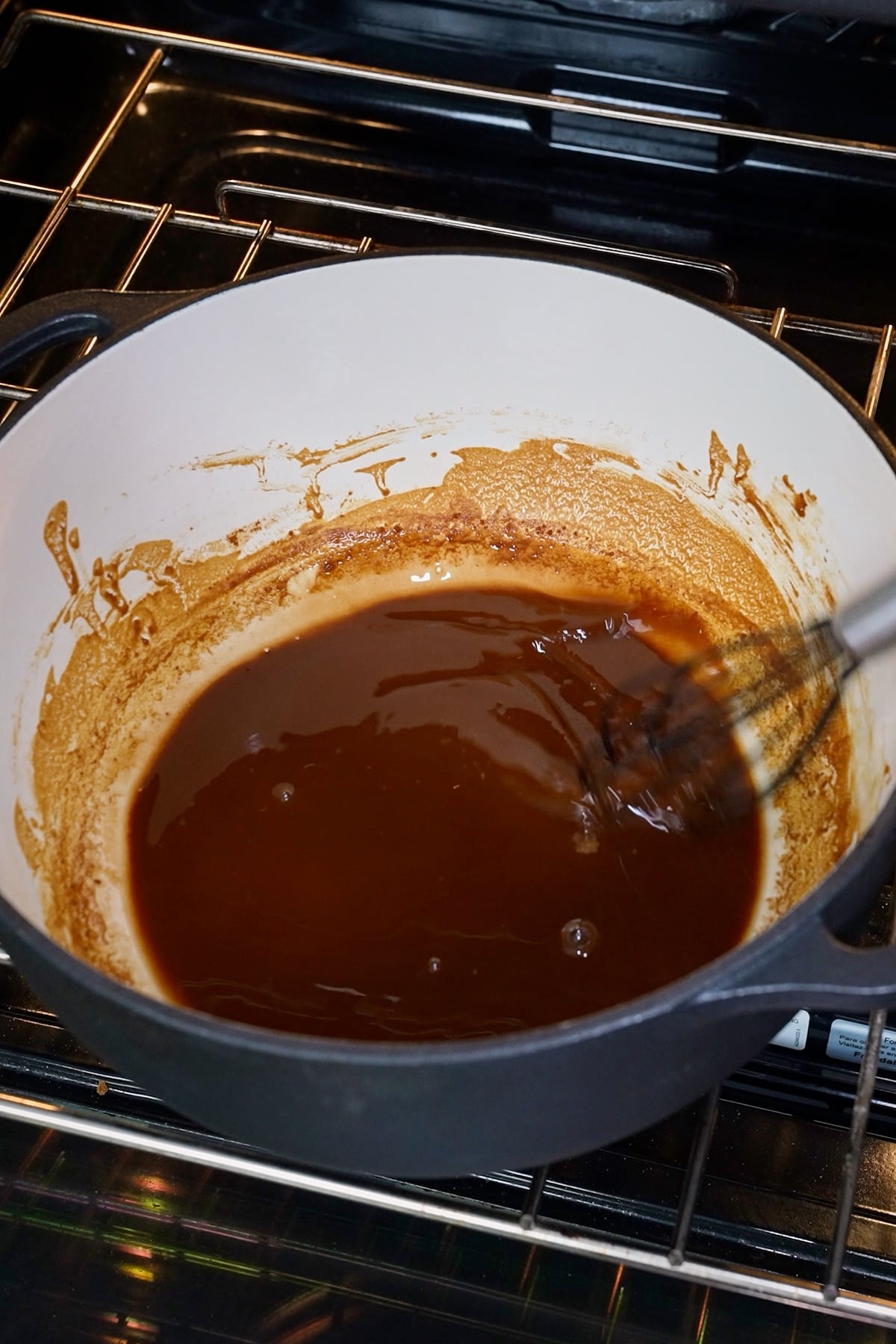 Dark roux in pot, in oven.