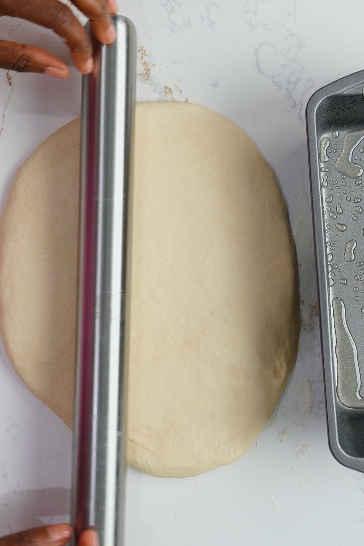 rolling pin rolling out dough