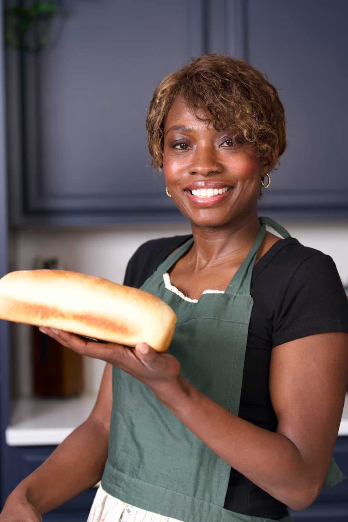 Tanya holding hardo bread.