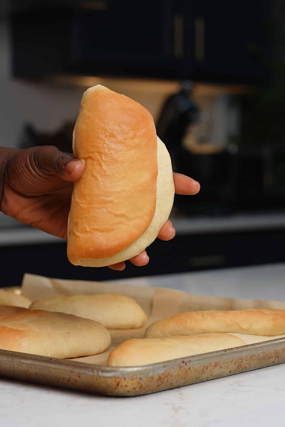 hand holding coco bread