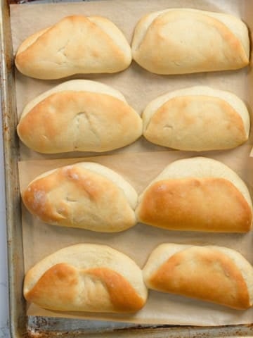 Jamaican coco bread on baking sheet