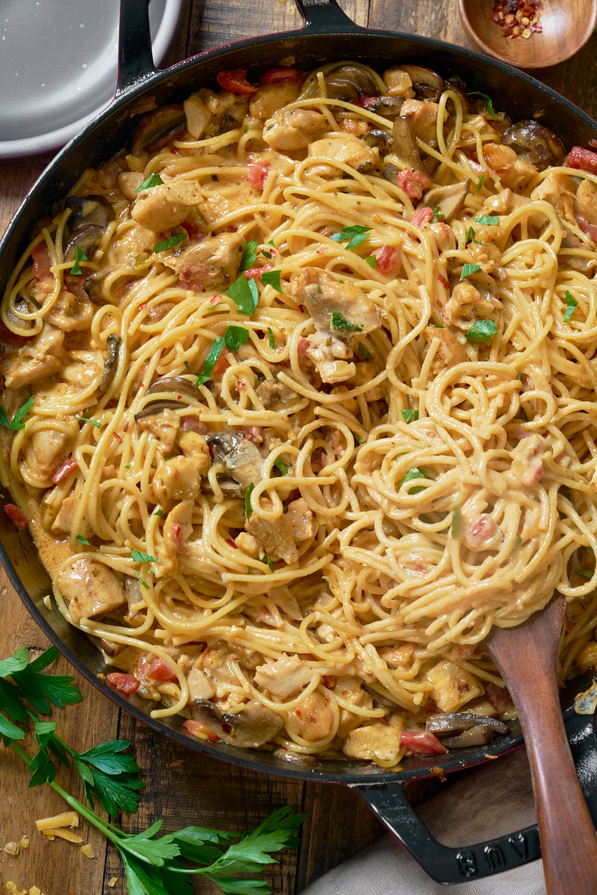 chicken spaghetti in skillet with spoon