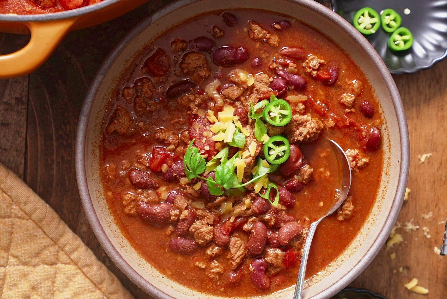 turkey chili in a bowl with toppings