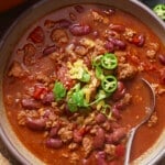 Turkey chili in a bowl with toppings