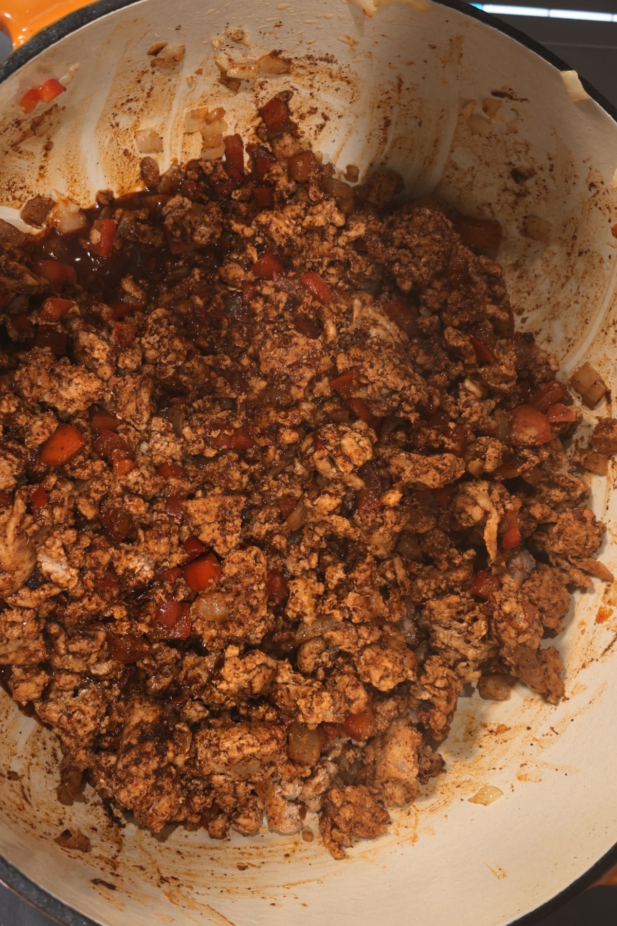 spices and ground turkey in pot cooking