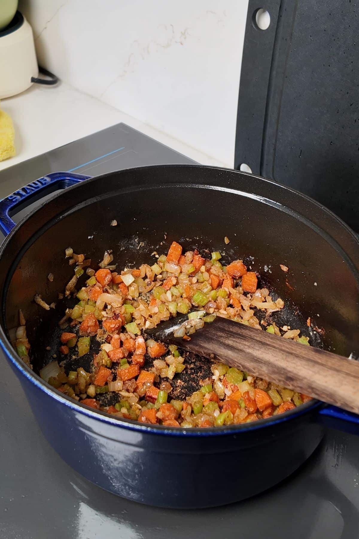 vegetables cooking in pot with flour