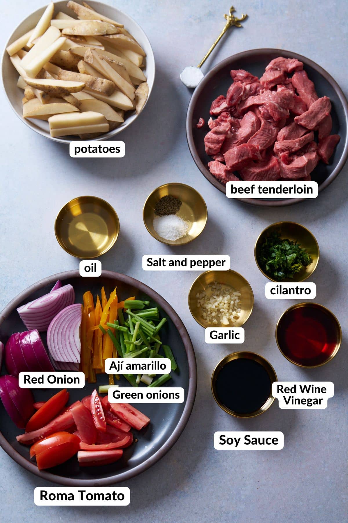 ingredients for lomo saltado in bowls