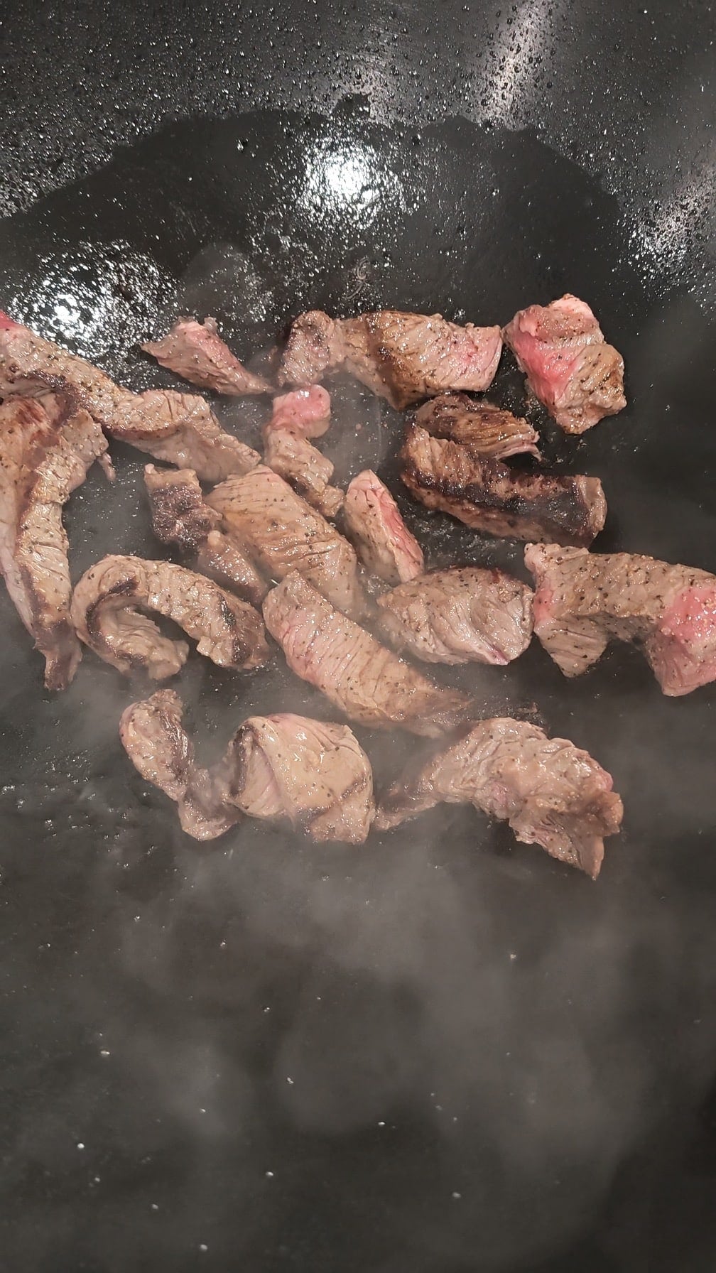 beef searing in wok